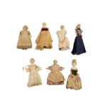 DOLLS: A COLLECTION OF SEVEN BISQUE SHOULDER PLATE DOLLS