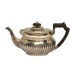 A GEORGE V STERLING SILVER BACHELOR TEAPOT, SHEFFIELD 1911 BY HENRY ATKIN