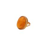 AN AMBER RING, EARLY 20TH CENTURY