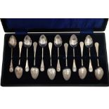 A CASED SET OF GEORGE V STERLING SILVER TEASPOONS, BIRMINGHAM 1913 BY A J BAILEY