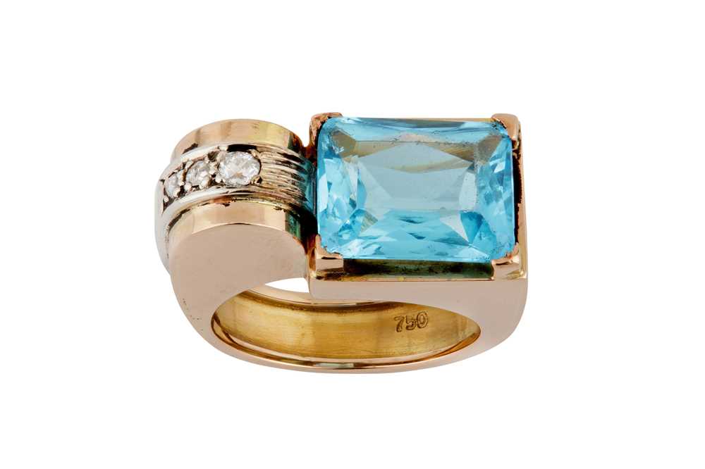A blue topaz and diamond ring