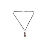 From the Private Collection of the late Jackie Collins | A diamond pendant necklace