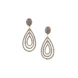 From the Private Collection of the late Jackie Collins | A pair of diamond earrings