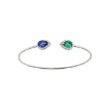 An emerald, sapphire and diamond torc bangle