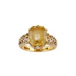 A yellow sapphire single-stone ring