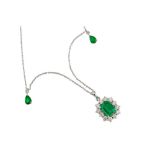 An emerald and diamond pendant necklace
