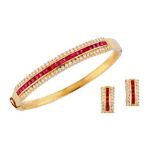 A ruby and diamond bangle and earclip suite
