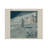 Apollo 15: Astronaut David Scott gives salute beside U.S. Flag