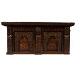 A Charles II oak and inlaid twin panel overmantel,