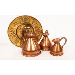 A graduated set of three copper measures, half gallon to pint,