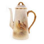 A Royal Worcester coffee pot and cover of tapering form, painted pheasants by James Stinton, signed,