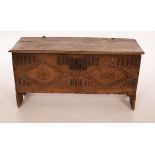 A James I small elm and oak fronted six plank chest,