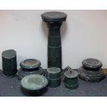 A pair of Italian green mottled marble pillars, the reeded columns on octagonal bases,