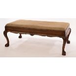 A 20th Century walnut long stool with drop-in seat,