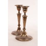 A pair of silver candlesticks, HE & Co.