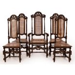 A set of five late 17th Century style English ebonised oak and cane high-backed chairs (one carver