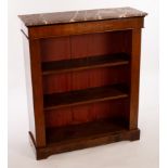 A Victorian marble top bookcase fitted adjustable shelves,