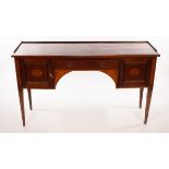 An Edwardian mahogany sideboard, inlaid bats wing and oval paterae,