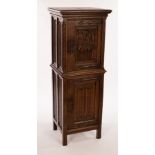 A Gothic style cupboard with linenfold panels and Gothic door, 46cm wide,