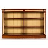 A pine open bookcase of four fitted shelves, 148cm wide,