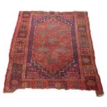 A Turkish tribal rug, West Anatolia, circa 1900, 140cm x 92cm and an Afghan rug,
