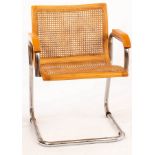 An Italian cantilever chair with caned back and seat CONDITION REPORT: Condition