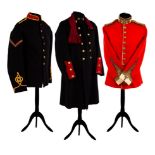 A Loyal Regiment (North Lancashire) uniform jacket with buttons and collar badge,