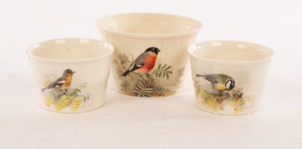 Three Royal Worcester soufflé pots painted a great tit, chaffinch and bullfinch by William Powell,