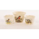 Three Royal Worcester soufflé pots painted a great tit, chaffinch and bullfinch by William Powell,