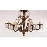 An early 20th Century gilt metal six-light electrolier,