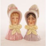 Two Royal Worcester candle snuffers, characters from Dickens, stamped marks to interior,
