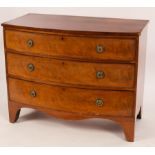 A Regency mahogany bowfront chest of three long graduated drawers,