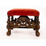 A William and Mary stool, the black lacquer base with gilded decoration,