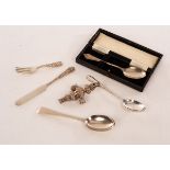 An American sterling silver Christening knife and fork, S Kirk & Son, a silver rattle, CC,