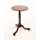 An early 18th Century oak tripod table,