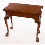 A Georgian mahogany tea table with shaped top and claw and ball feet, 77cm wide, 36.