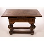 A 17th Century and later Flemish oak draw-leaf dining table,