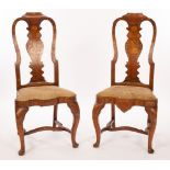 A pair of 18th Century Dutch walnut and floral marquetry chairs,