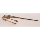 A George IV silver meat skewer, makers mark indistinct, London 1826, with reeded ring handle, 30.
