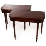 A pair of Regency mahogany fold-over card tables,