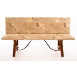 A Spanish Gothic folding bench with upholstered seat and rectangular hinged back,