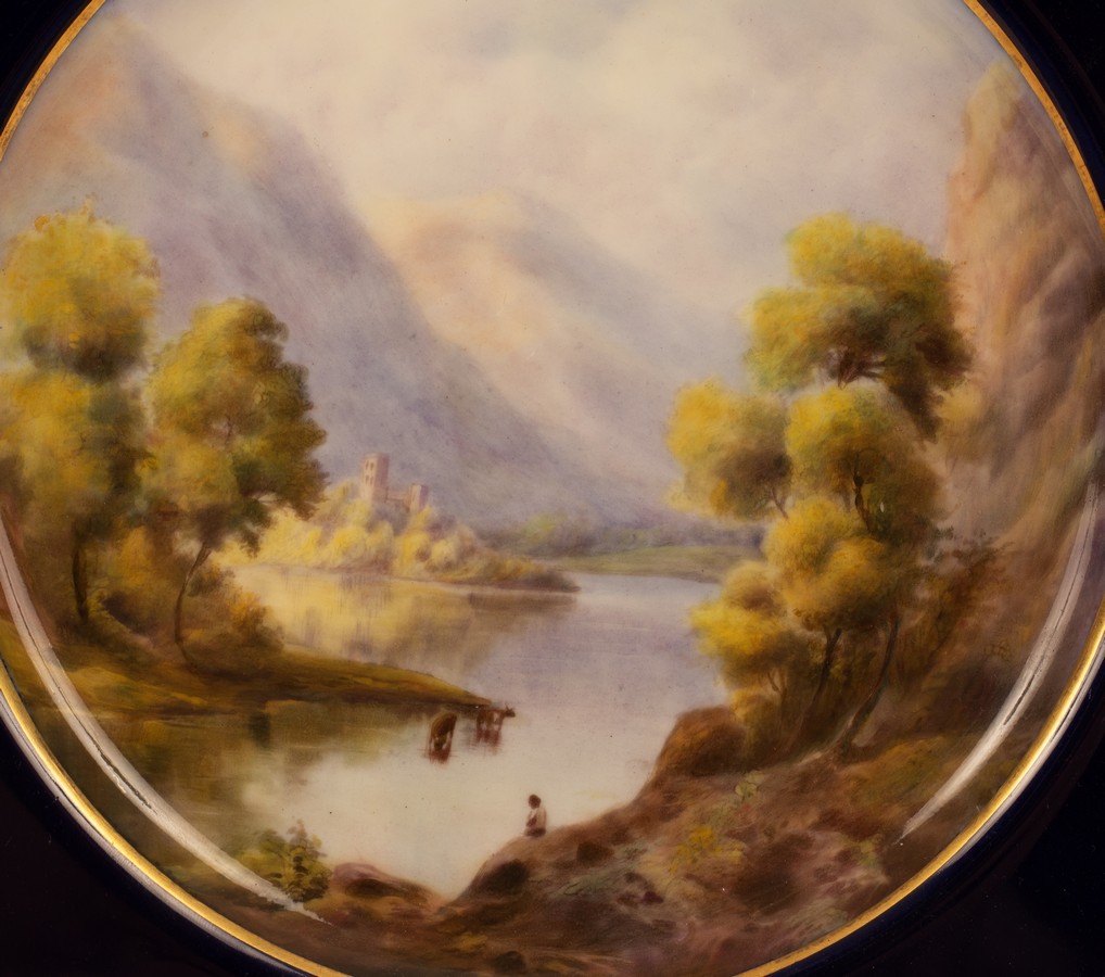 A Royal Worcester plate, 1922, painted a lake and mountain landscape by James Stinton, signed, - Image 2 of 3