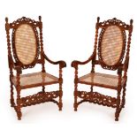 A pair of late 17th Century Flemish walnut and cane high-backed open armchairs,