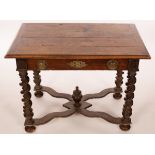 A late 17th Century and later side table, the planked ash top over a single frieze drawer,