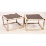 A pair of 1970s painted coffee tables on square metal bound frames,