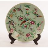 A 20th Century celadon saucer dish decorated butterflies and flowers,