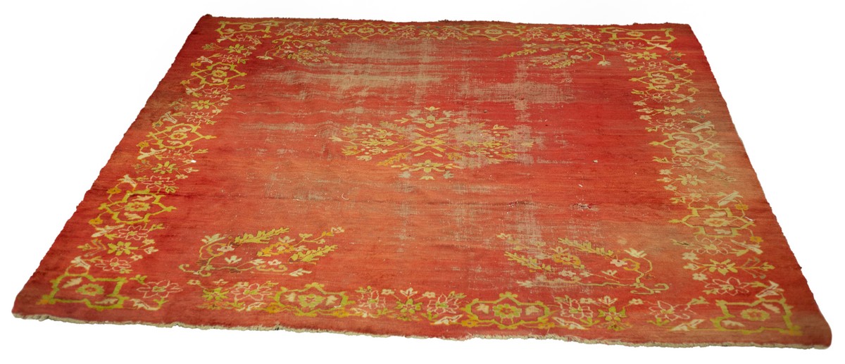 An Eastern European red ground carpet, mid 20th Century,