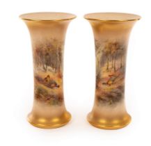 A pair of Royal Worcester waisted cylindrical vases,