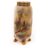 A Royal Worcester vase with a reticulated flanged top,