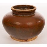 A Chinese globular pot, early 20th Century, with brown glaze, rim and base unglazed,
